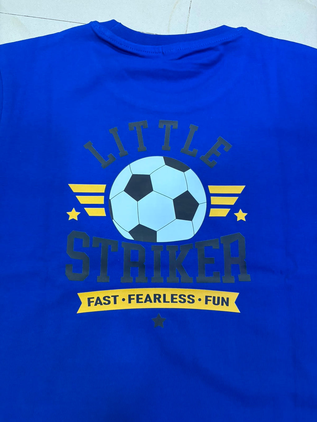 Kids "Little Striker" Soccer Graphic T-Shirt | Royal Blue Short Sleeve Crewneck Tee (Fast, Fearless, Fun)